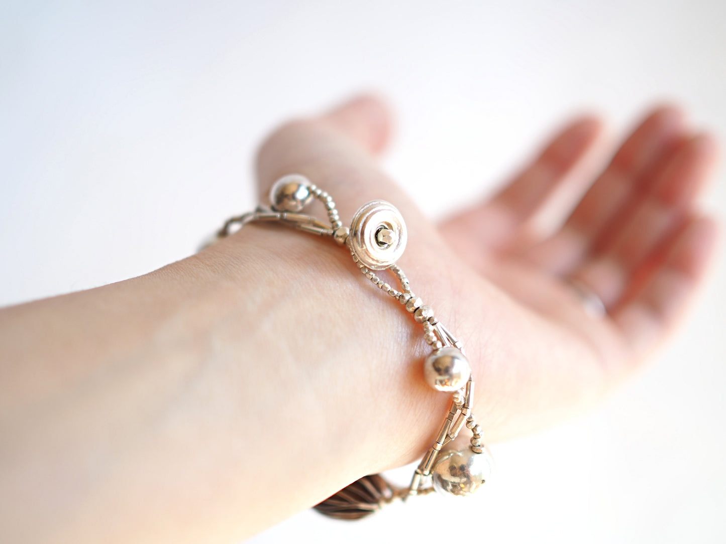 Round ball silver triple bracelet