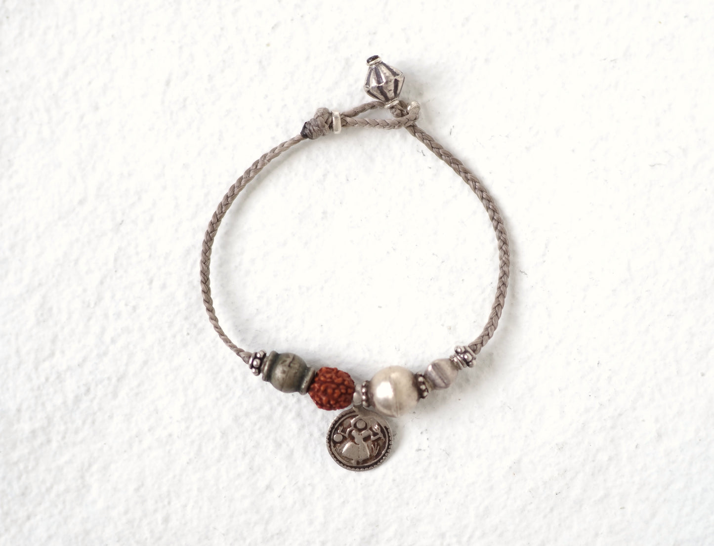 -old india coin- code bracelet