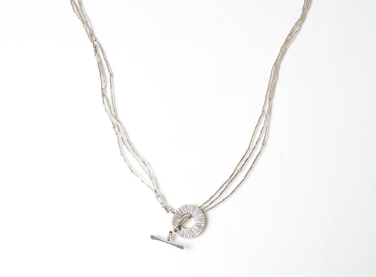 Triple long _ mantel necklace