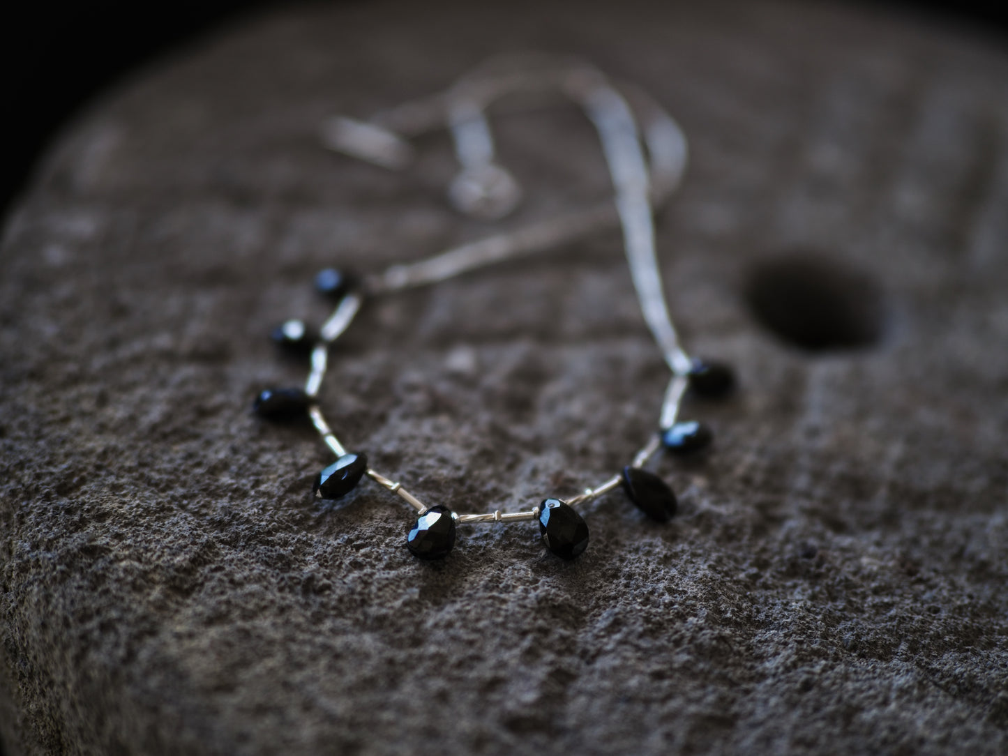 -Black spinel- silver BIB