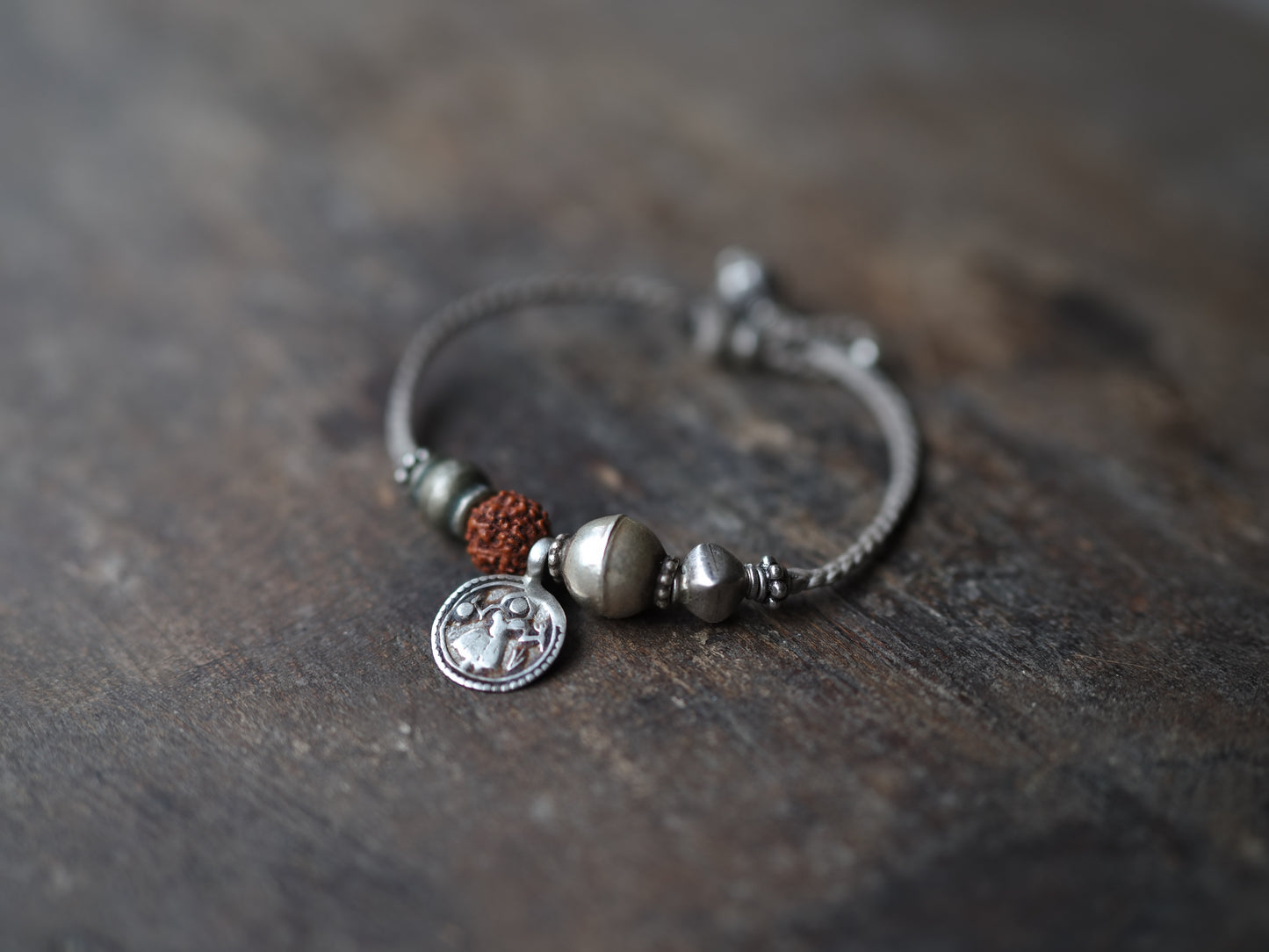 -old india coin- code bracelet