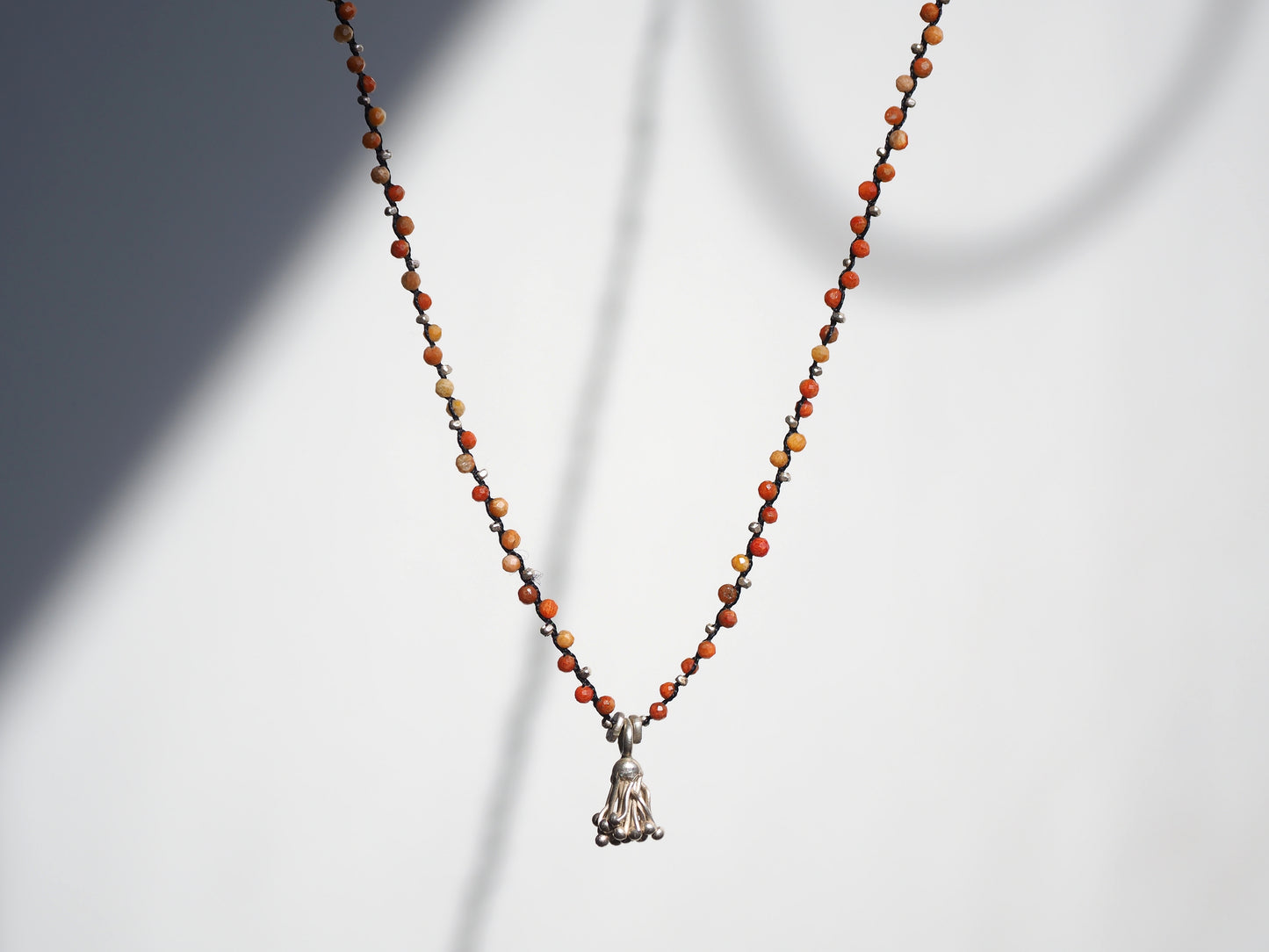 -African coral- braid long pendant