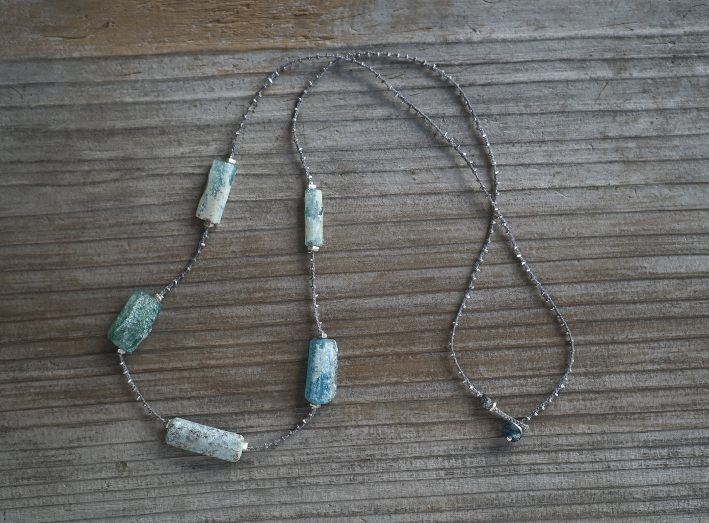 -Roman glass- silver braid