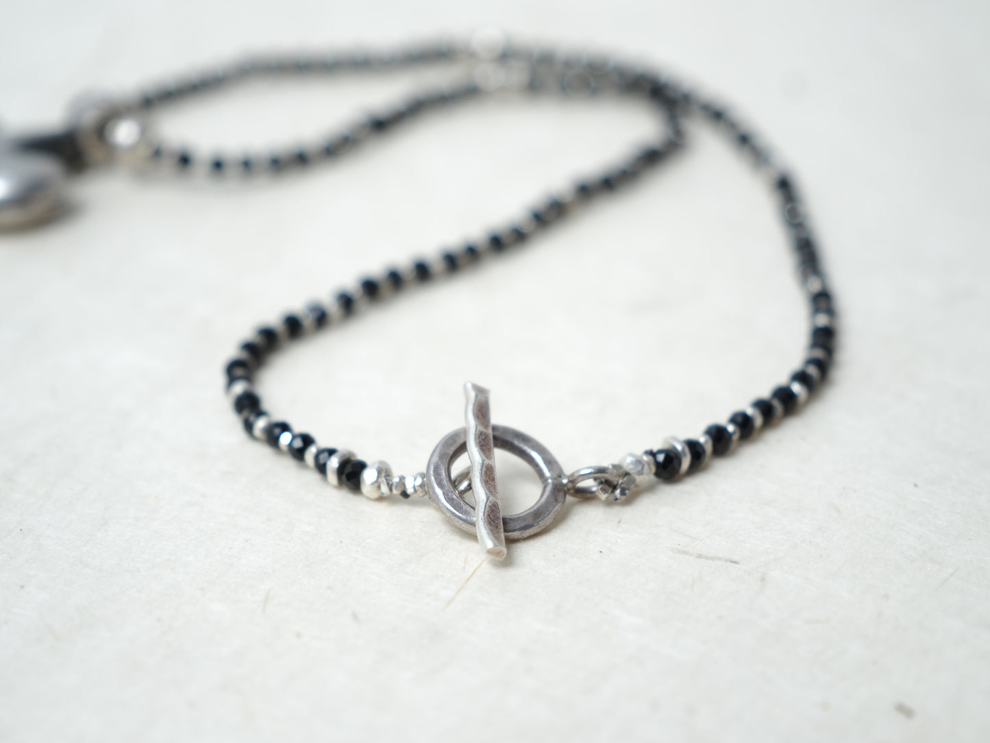 -India old silver- "black & silver"