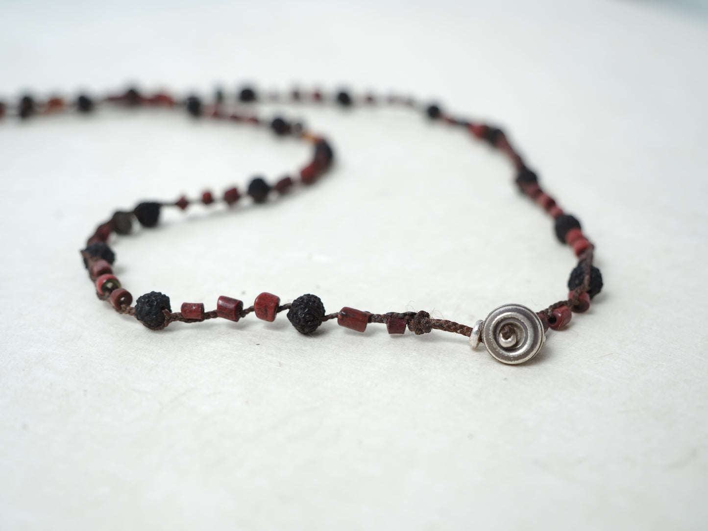 -India old silver- "black & red" braid