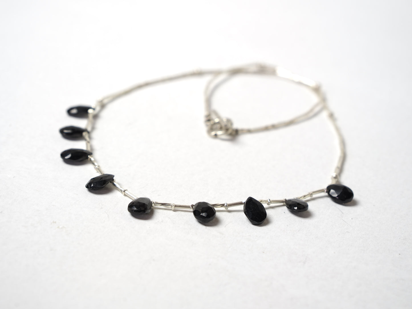 -Black spinel- silver BIB