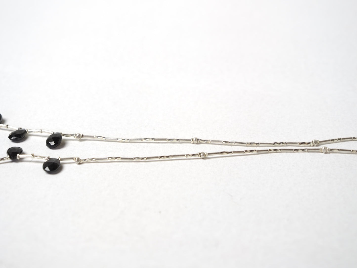 -Black spinel- silver BIB