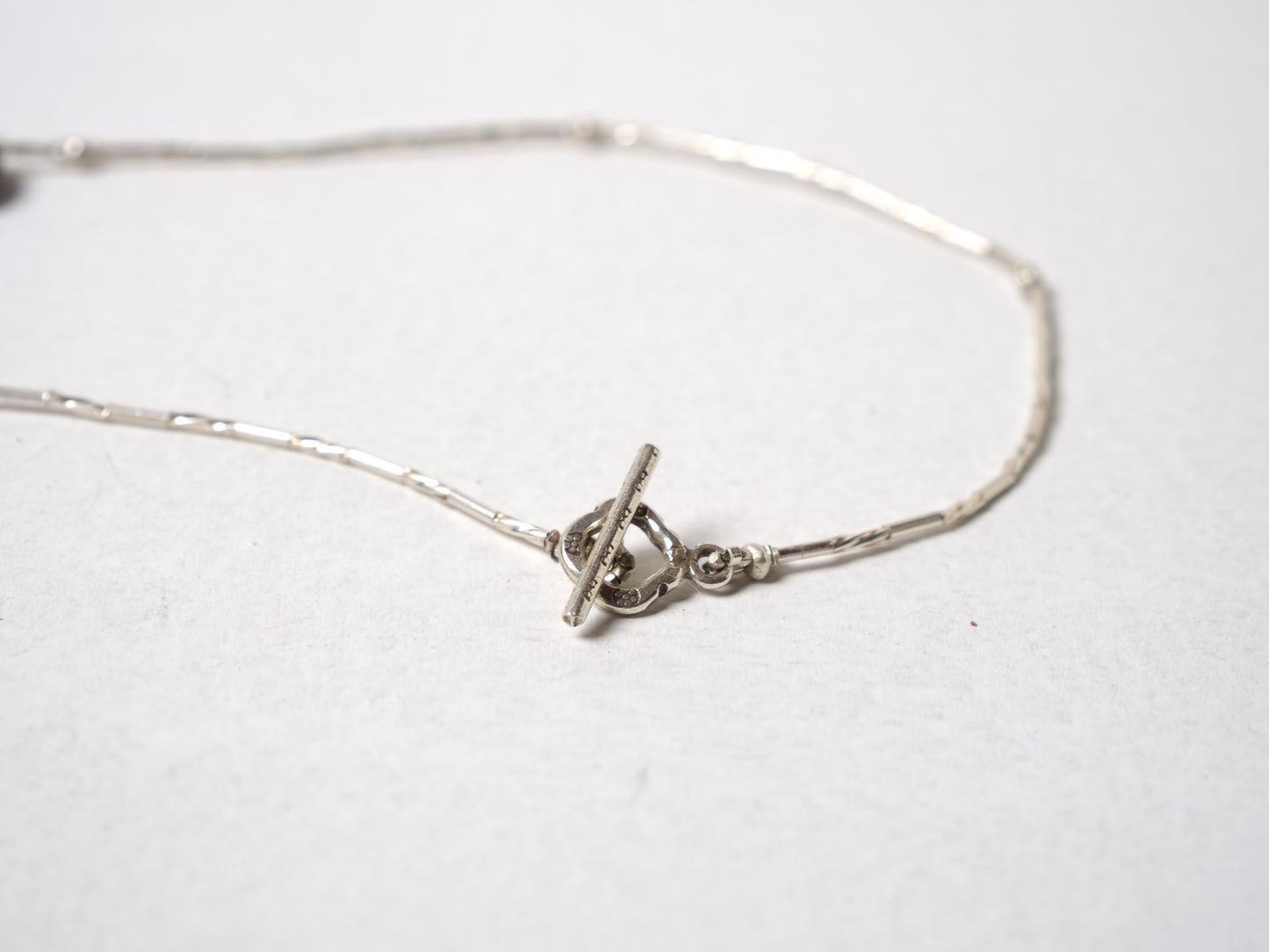 -Black spinel- silver BIB