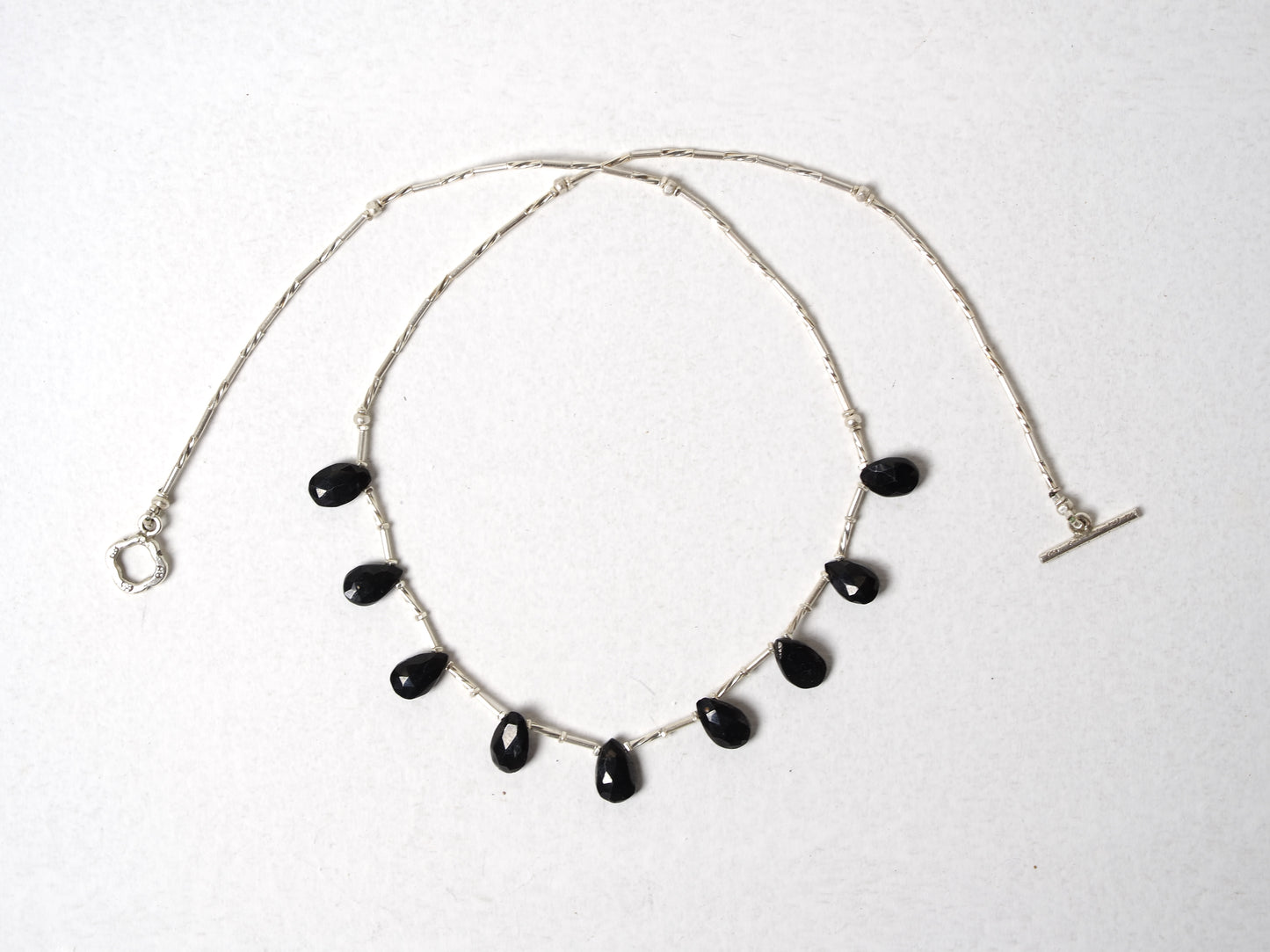 -Black spinel- silver BIB