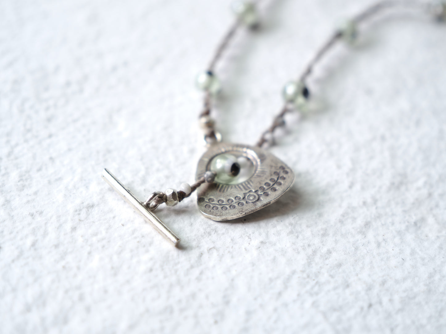 -Eye beads・Howlite- braid mantel necklace