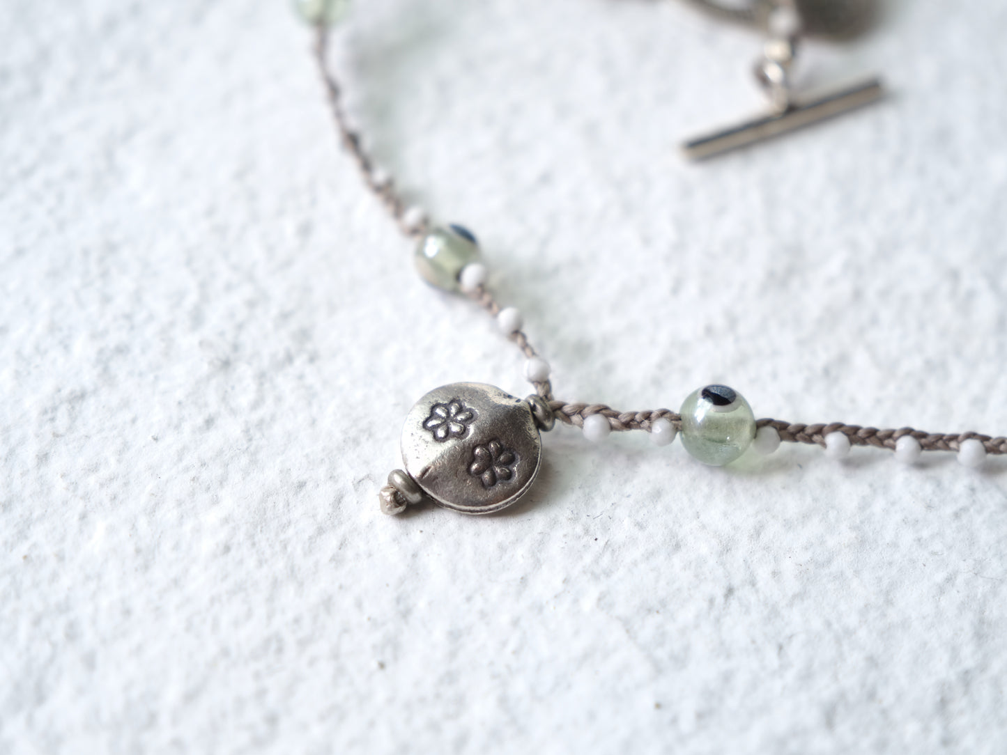 -Eye beads・Howlite- braid mantel necklace