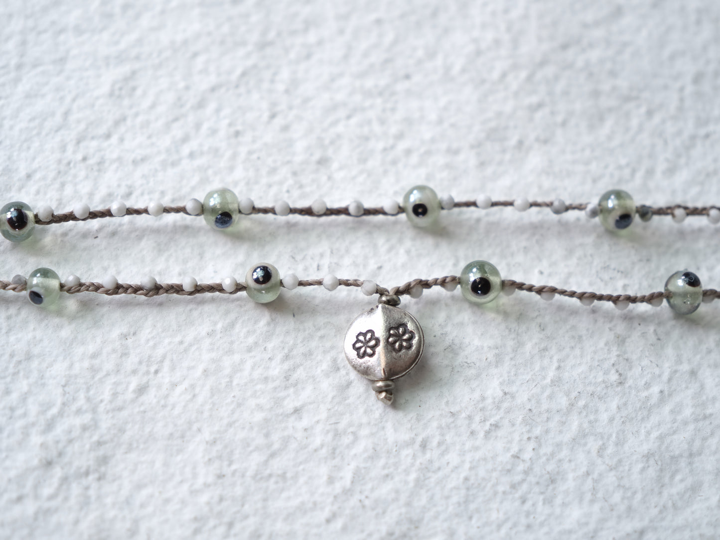 -Eye beads・Howlite- braid mantel necklace