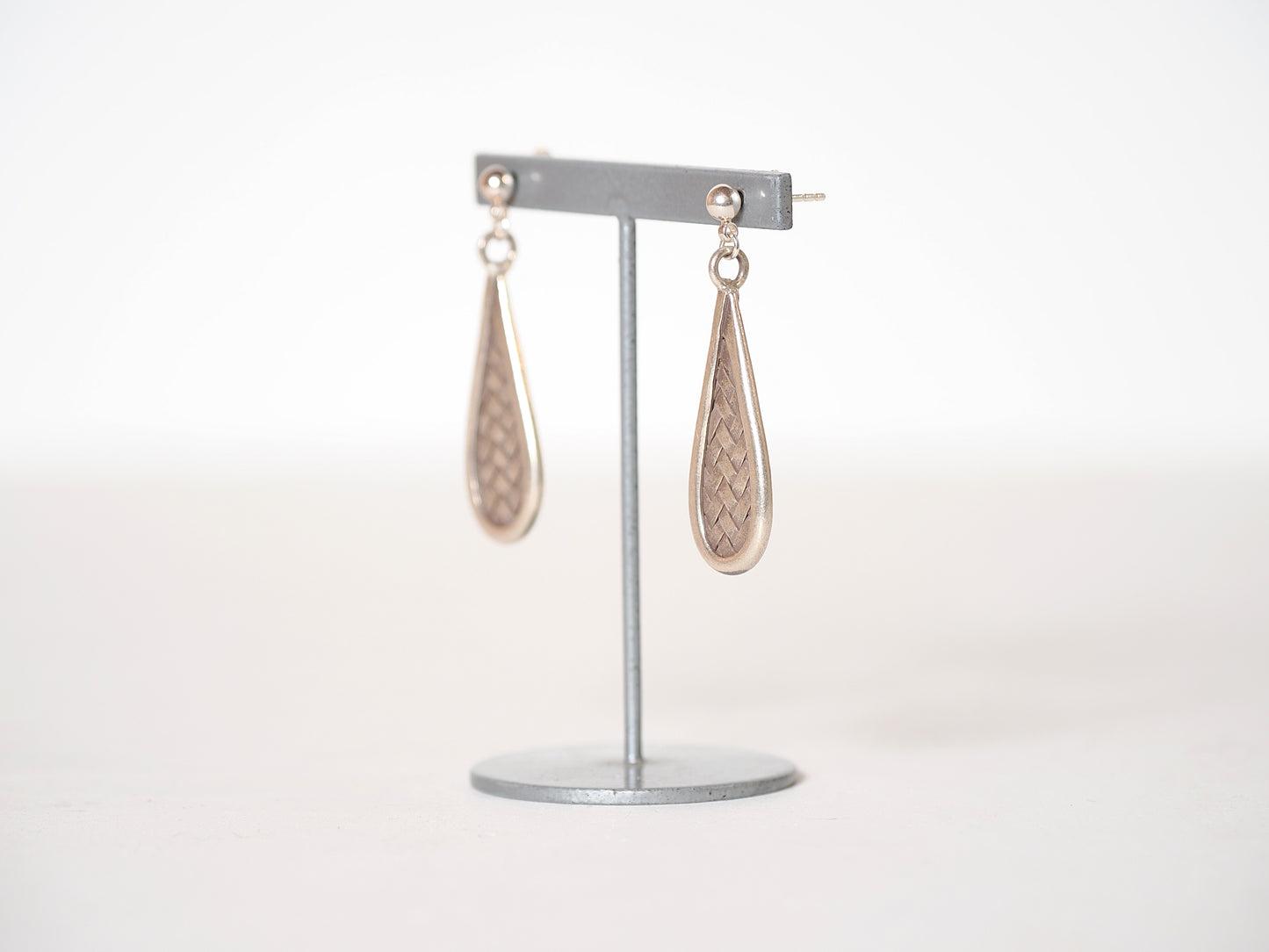 -Plaited silver- studs