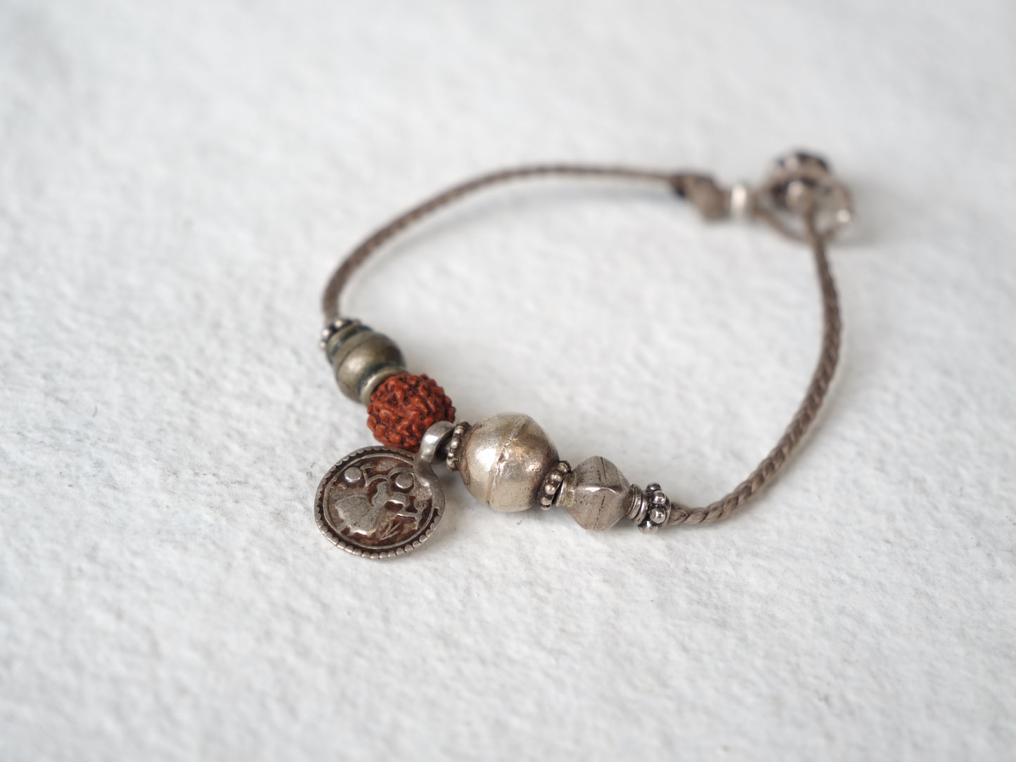 -old india coin- code bracelet