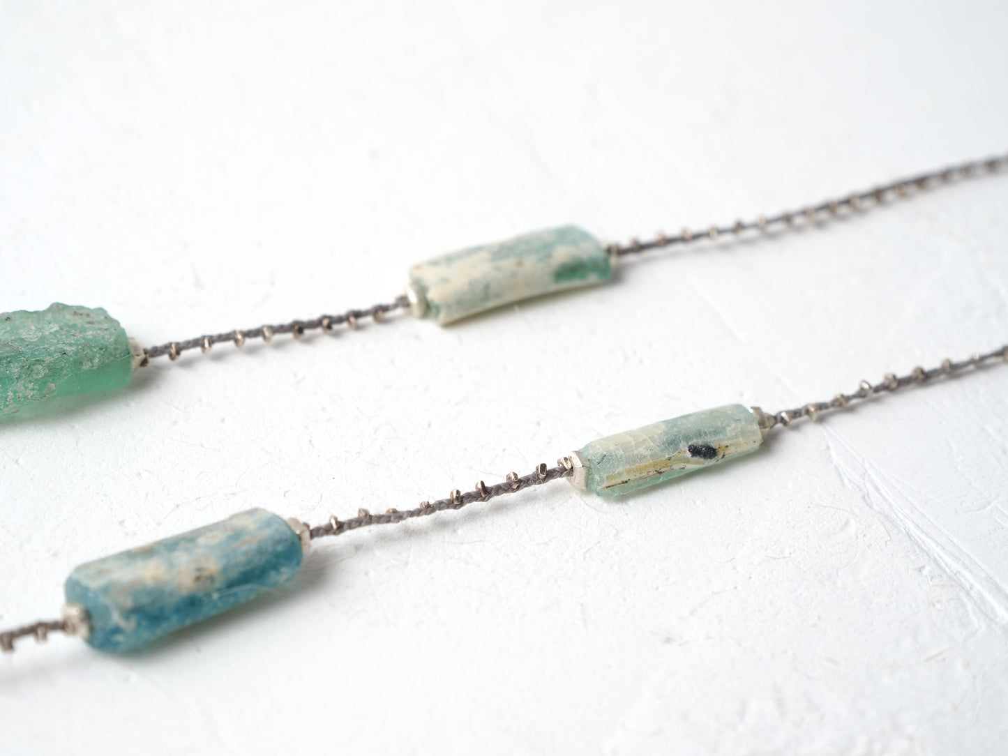 -Roman glass- silver braid