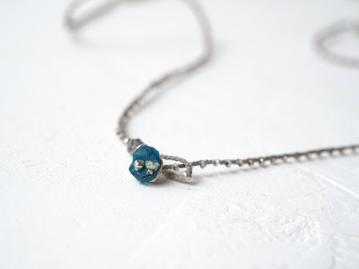 -Roman glass- silver braid