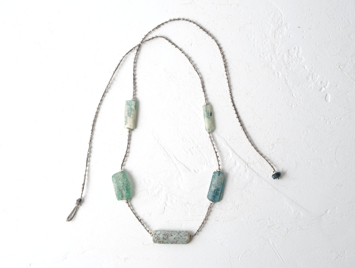 -Roman glass- silver braid