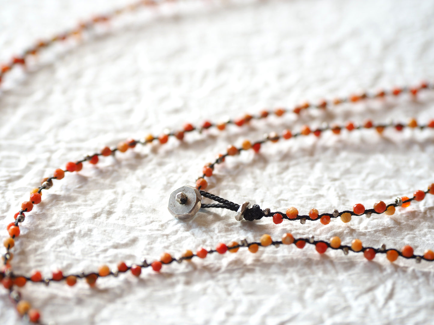 -african coral- braid "long" pendant