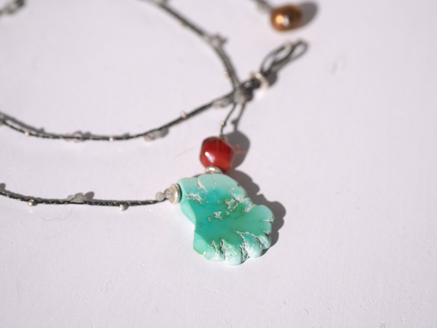 -Sleeping_beauty turquoise・Tibetan andesine- braid pendant