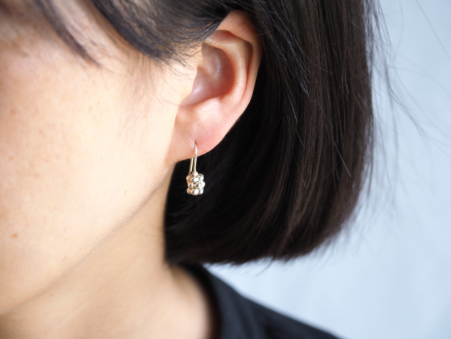 silver corolla earrings 