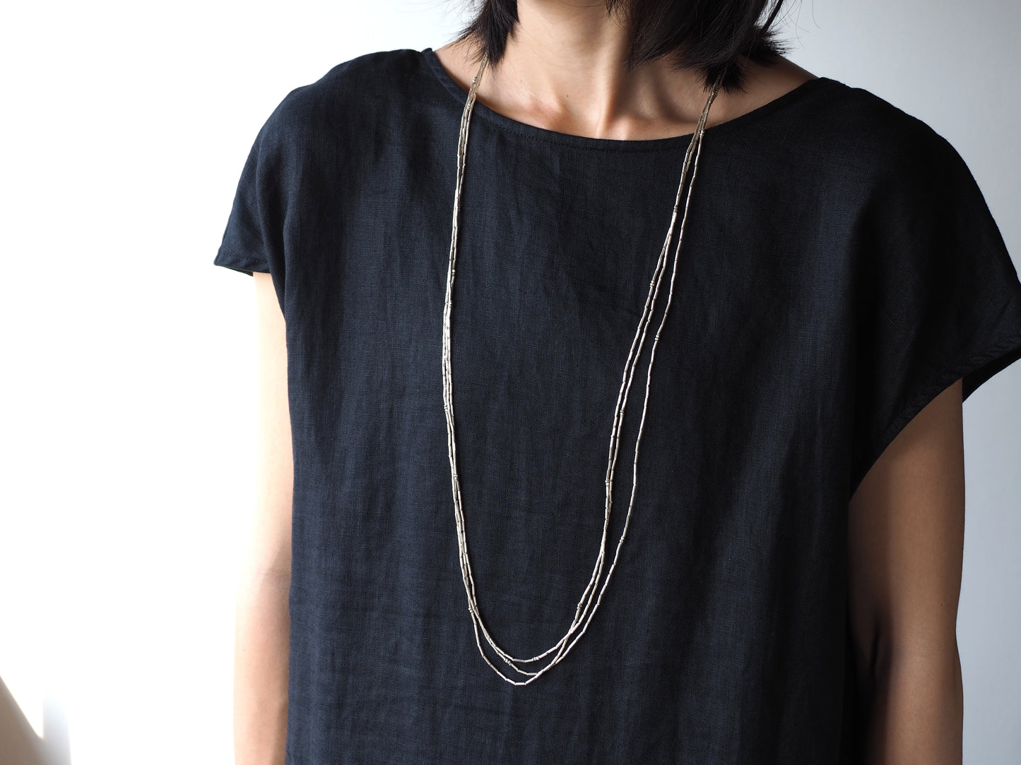 Triple long _ mantel necklace