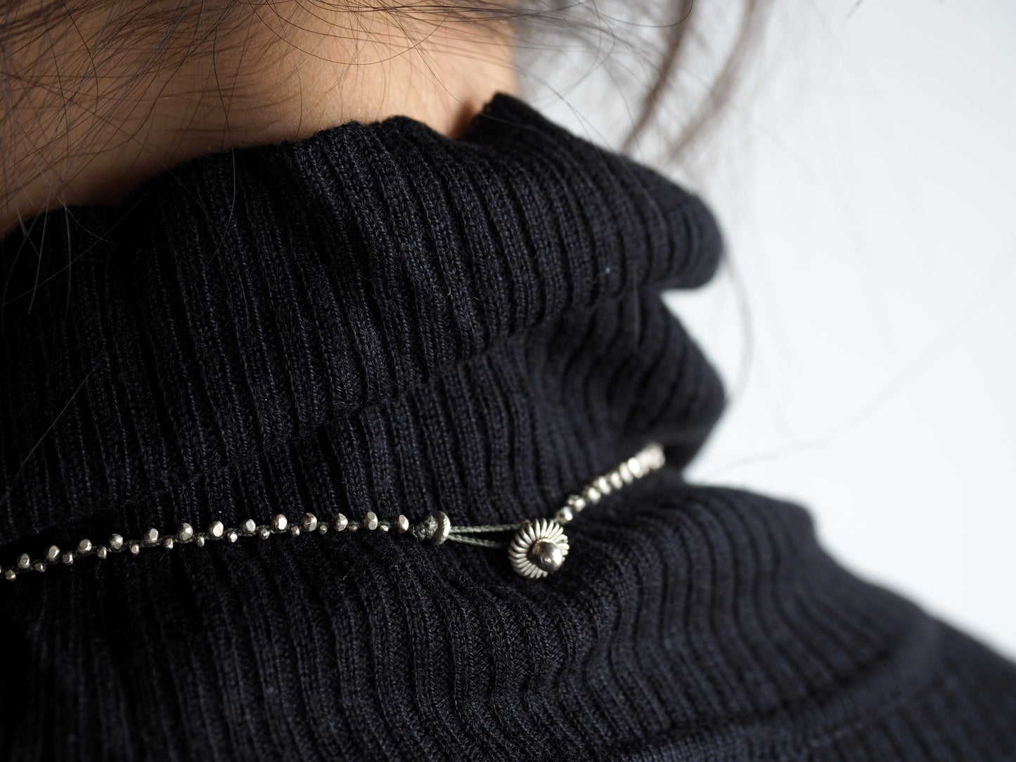 Silver braid pendant "straw knitting"