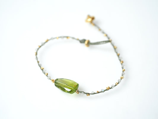 -Peridot- gold braid bracelet