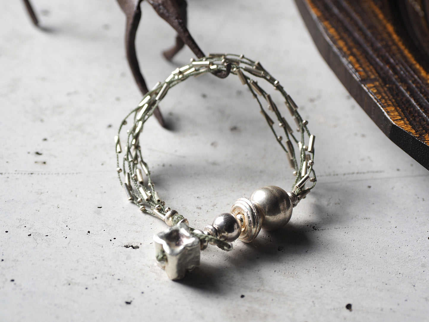 Braided silver six-strand bracelet