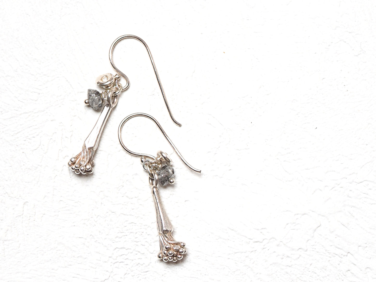 silver x gray diamond earrings
