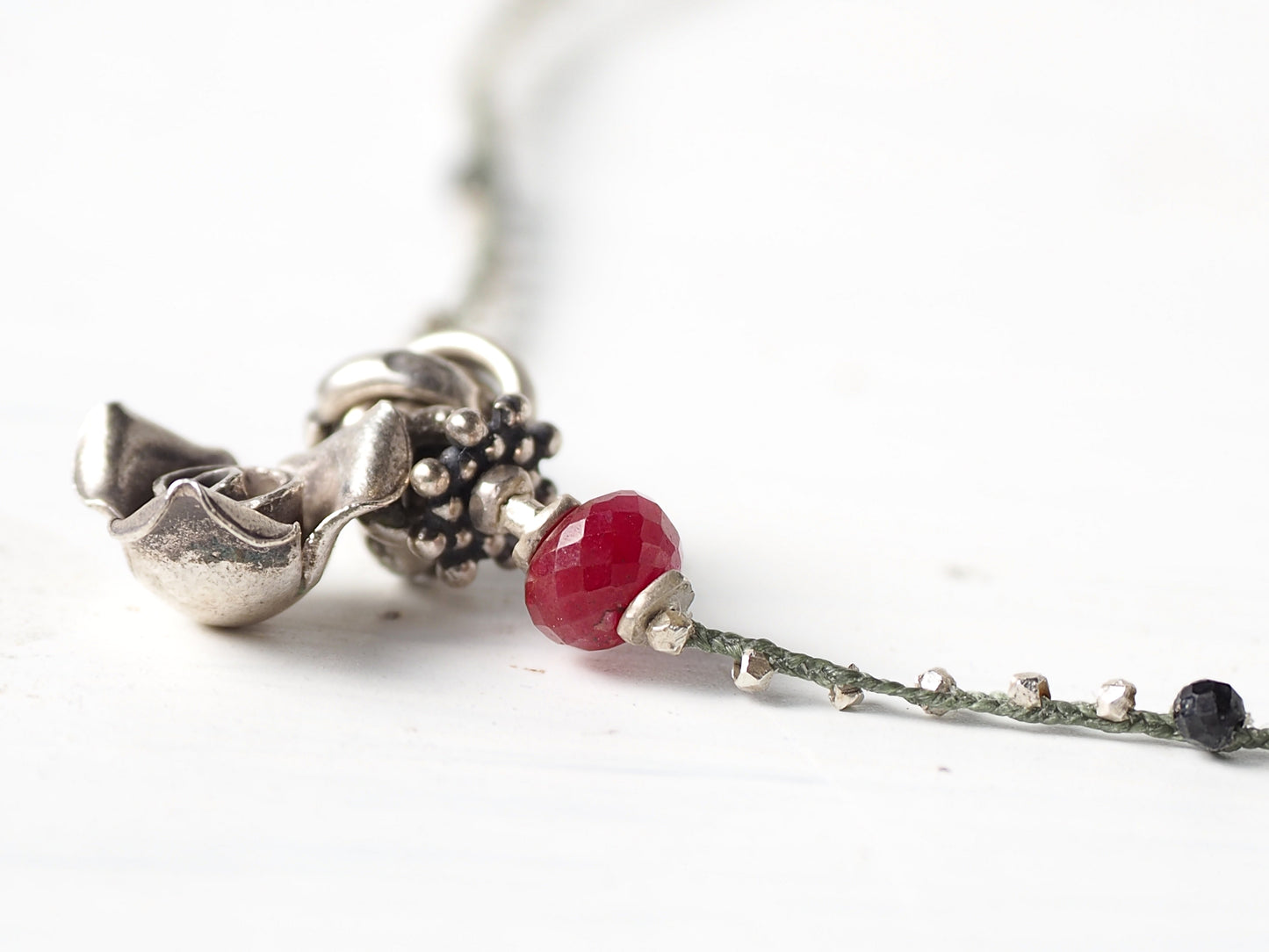 flower and ruby ​​braided pendant