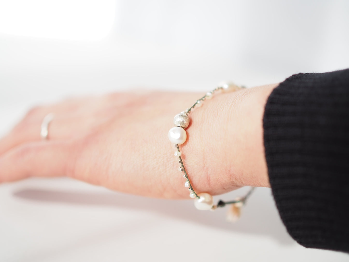 Freshwater pearl silver braided bracelet